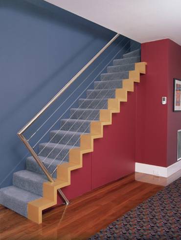 Escada que parece uma pintura tridimensional na parede.